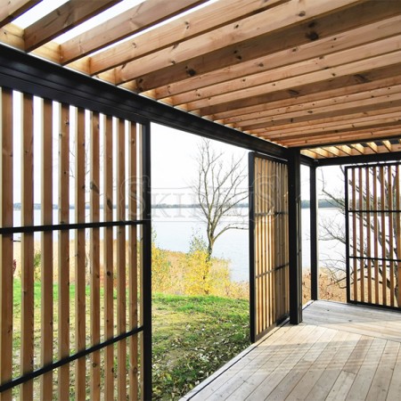 SKIRPUS exterior sliding shutters with vertical wooden louvers in Utena (LITHUANIA)